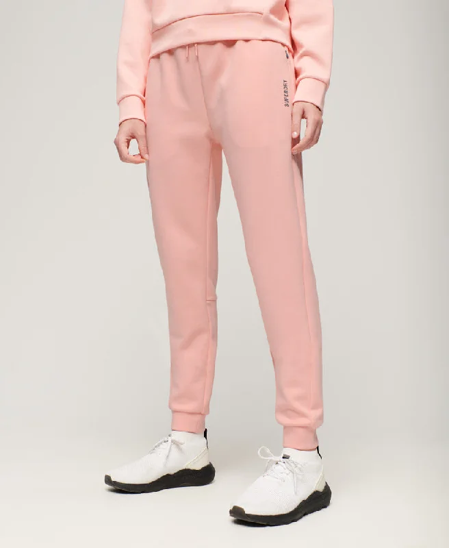 Graceful Movement Sports Tech Slim Joggers | Peach Pearl Pink